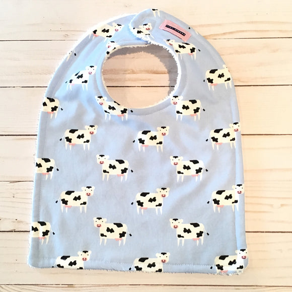 Cows on Light Blue Bib
