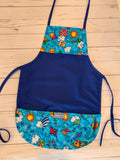 FLYING KITES ON RED OR BLUE TODDLER APRON
